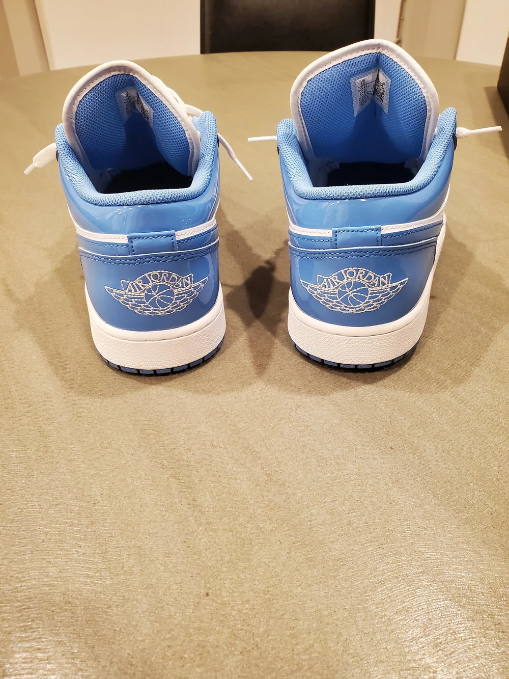 Jordan 1 Low Top Sneakers White and University Blue
